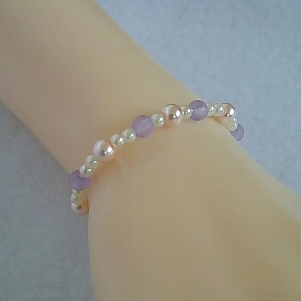 Girls pink and lavender beaded bracelet